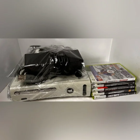 Microsoft Xbox Console with Controller and cords. 60GB. Some staining. Tested